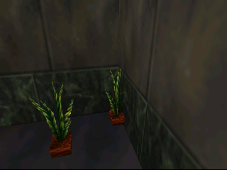 There's a pad for another one on the other side of the room but the plant placed on it ends up partially inside the wall.