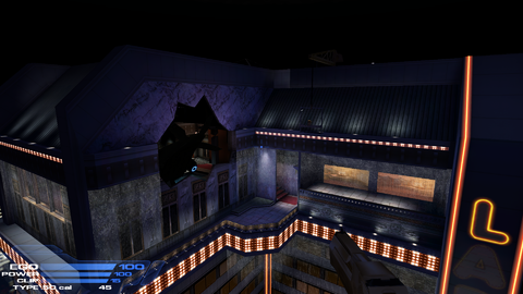 Outside. The pulley elevator was moved to the left side of the building in the later version of the map, not above the room where you obtain the Deagle.